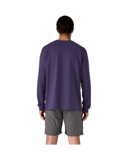 Person wearing a purple long-sleeve shirt and gray shorts on a transparent background