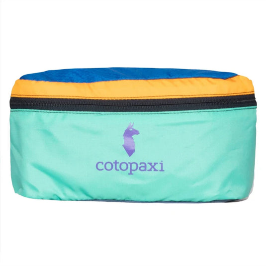 A Cotopaxi Bataan 3L fanny pack with blue, green, and orange colors, featuring a front zippered pocket and an adjustable hip belt strap.