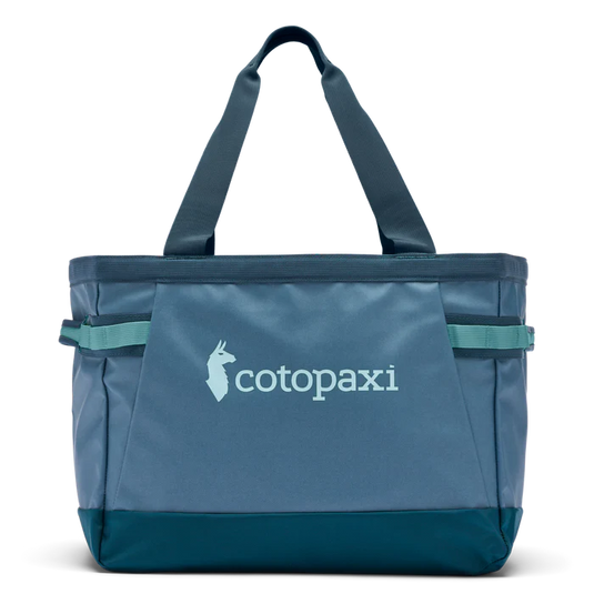A light blue Cotopaxi Allpa 30L Gear Hauler Tote with brand logo visible on the side.