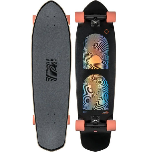 A 36-inch Globe Blazer XL Complete Cruiser skateboard with a diamond tail, built-in bottle opener, and colorful wave pattern on the deck. It includes soft conical wheels, Tensor alloy trucks, and is constructed from Resin 7 hard rock maple.