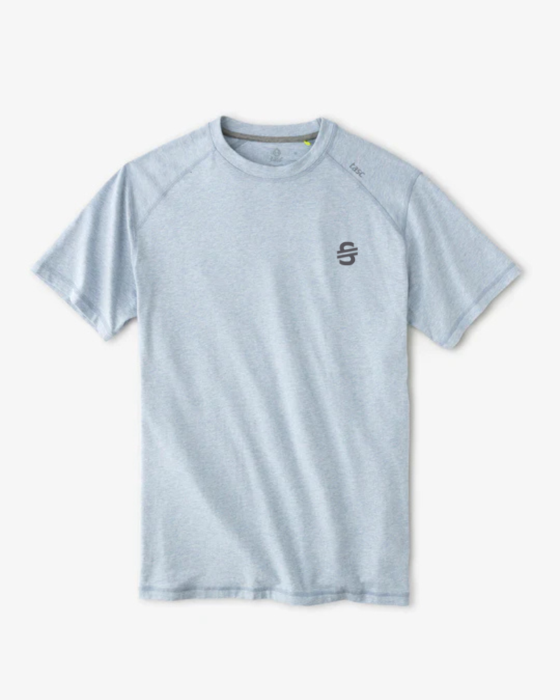 Load image into Gallery viewer, Light blue t-shirt with a small S&amp;T logo on a white background
