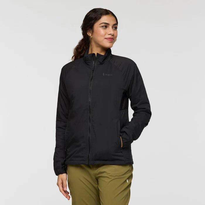 Load image into Gallery viewer, Woman wearing a black jacket with a visible brand logo on a light gray background
