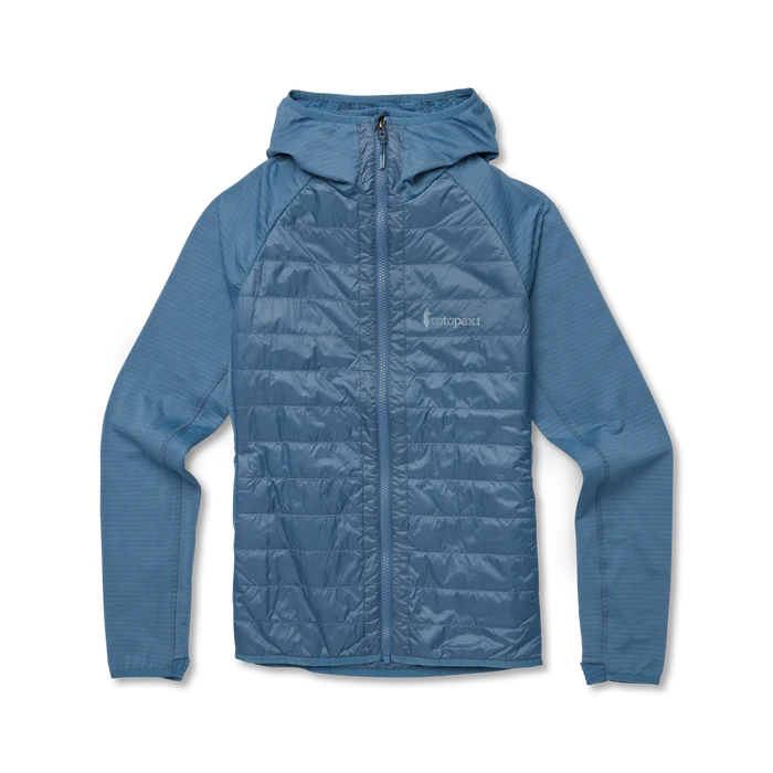 Load image into Gallery viewer, Blue puffer jacket with a hood on a white background
