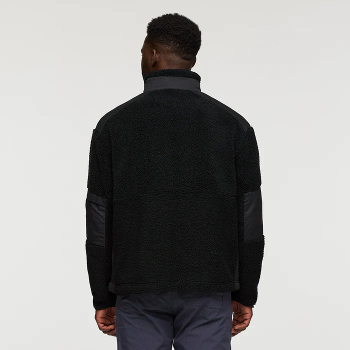 Load image into Gallery viewer, Person wearing a black jacket with leather sleeves on a white background

