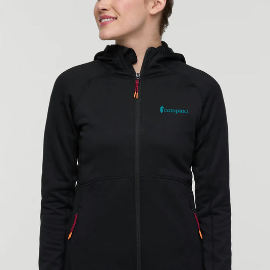 Black jacket with a Cotopaxi logo on a gray background