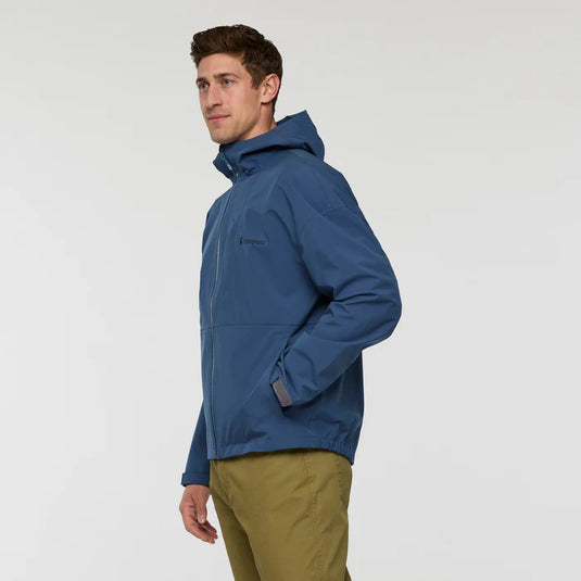 Man wearing a blue jacket on a white background