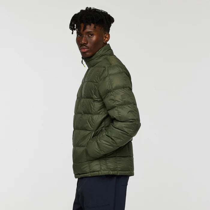 Load image into Gallery viewer, Man wearing a green puffer jacket on a white background

