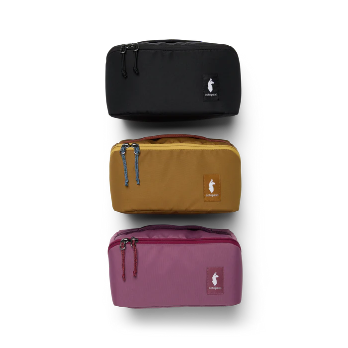 Load image into Gallery viewer, Three travel bags in black, brown, and purple on a white background
