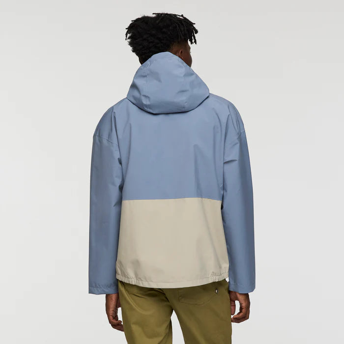 Load image into Gallery viewer, Person wearing a two-tone blue and beige jacket on a plain background
