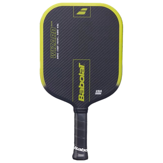 A Babolat Wizard Pro2 pickleball paddle with a dark gray carbon fiber pattern face, bright yellow trim, and a black grip, shown against a solid black background. Ski & Tennis Station