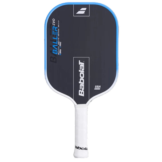 A Babolat Baller Evo pickleball paddle on a solid white background, featuring a dark gray face with a bright blue border, white and blue branding, and a white wrapped handle. Ski & Tennis Station