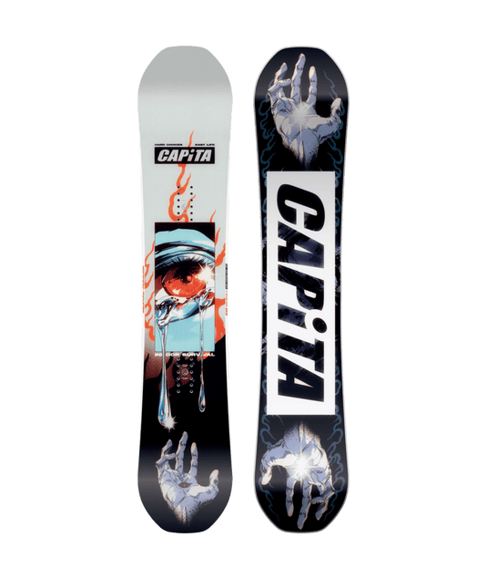 A Capita branded snowboard with a graphic design featuring what appears to be stylized hands and red eye and accent