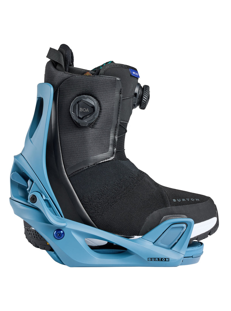 Load image into Gallery viewer, Black snowboarding boot in blue binding on a white background
