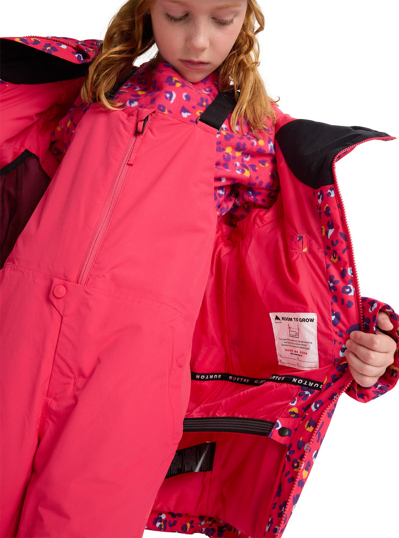 Load image into Gallery viewer, Child wearing a bright pink Burton snowsuit and jacket with floral patterns on a white background
