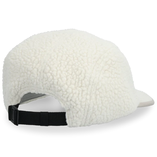 White sherpa-lined cap with a black strap on a white background