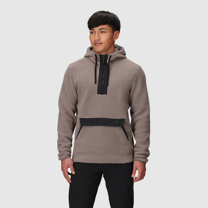 Man wearing a brown hoodie with black accents on a white background