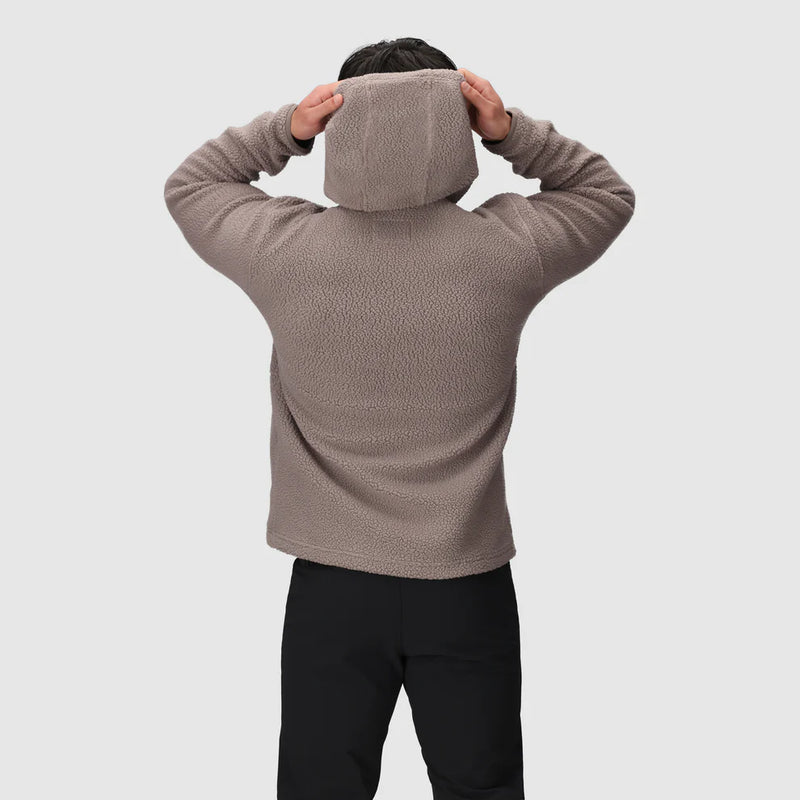 Load image into Gallery viewer, Person wearing a beige fleece jacket with hood on a light gray background
