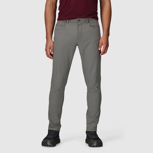 Person wearing gray pants on a white background