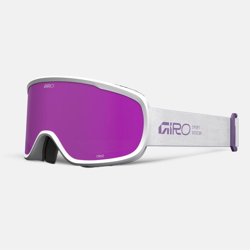 Load image into Gallery viewer, Giro ski goggles with purple lens and white frame on a light gray background
