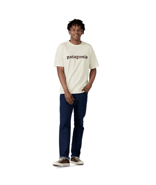 Person wearing a Patagonia t-shirt on a transparent background