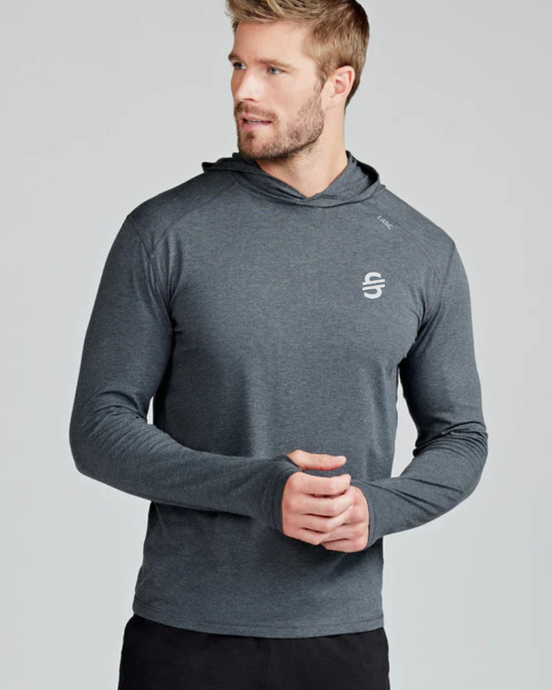Load image into Gallery viewer, Man wearing a gray hoodie with a logo on a light gray background
