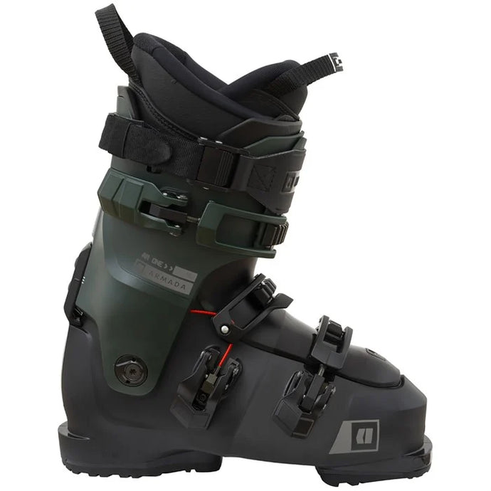 Black ski boot with multiple straps on a white background