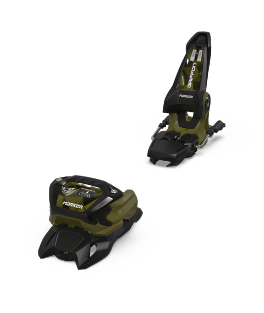 Two green and black ski bindings on a white background