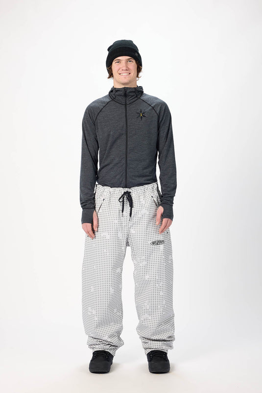 A man modeling Airblaster gray checkered snow pants. Ski and Tennis Station