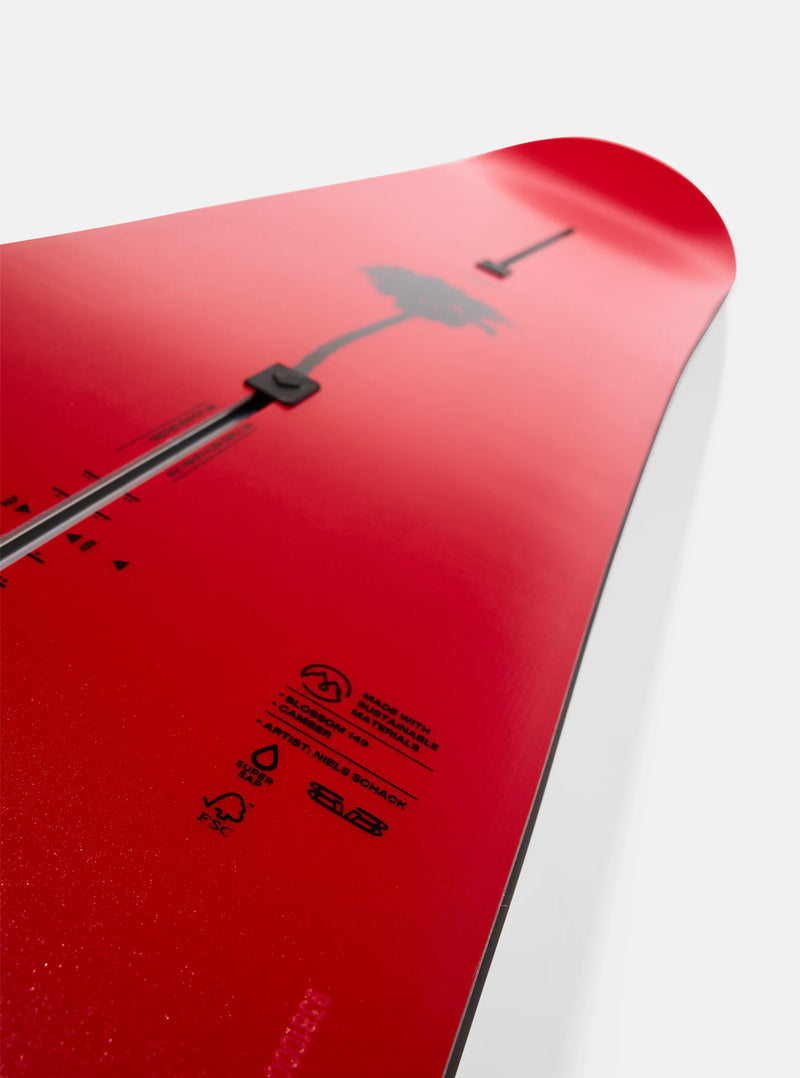 Load image into Gallery viewer, Close-up of a red snowboard with black graphics and text.

