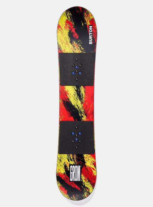 Colorful skateboard deck with black and red design on a white background
