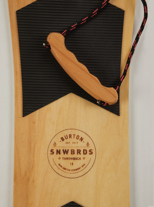 Wooden snowboard with logo and rope detail
