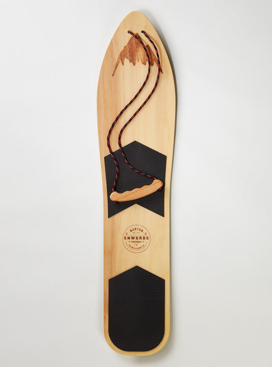 Wooden snowboard deck with mountain design on a white background