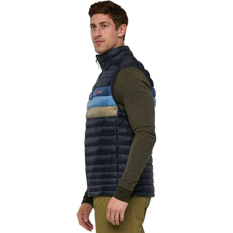 Load image into Gallery viewer, Man wearing a striped puffer vest on a white background
