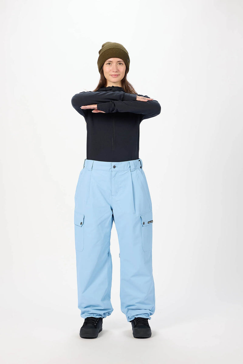 Load image into Gallery viewer, Person wearing light blue Airblaster snow pants with cargo pockets. Ski and Tennis Station
