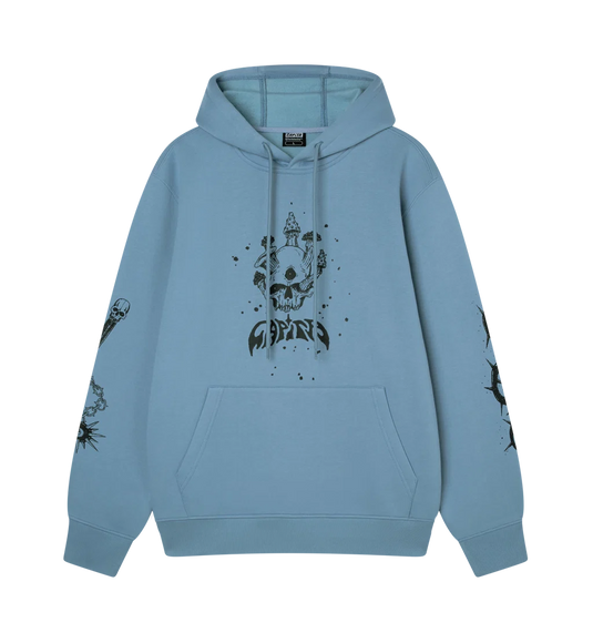 A light blue pullover hoodie with a black graphic print of a skull wearing a crown and the word 'Capita' on the front, with matching black sleeve prints, shown against a plain white background.