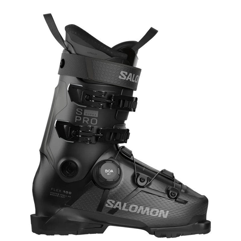 Load image into Gallery viewer, A Salomon supra 100 ski boot in matte black with gray branding and technical detailing, featuring a BOA dial closure system, shown on a solid white background. Ski and Tennis Station
