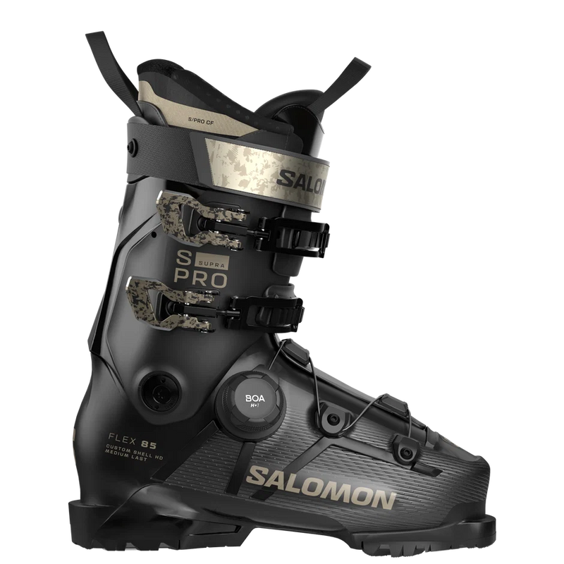 Load image into Gallery viewer, Salomon s pro supra 85 women's ski boot in black with silver and camouflage accents, featuring a BOA dial closure system, shown on a white background.
