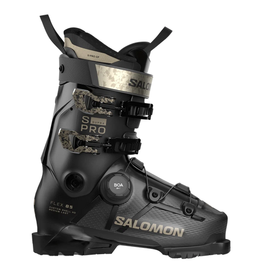 Salomon s pro supra 85 women's ski boot in black with silver and camouflage accents, featuring a BOA dial closure system, shown on a white background.
