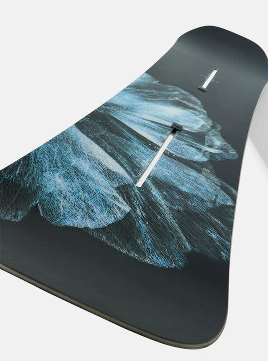 Snowboard with line-based landscape design on a white background