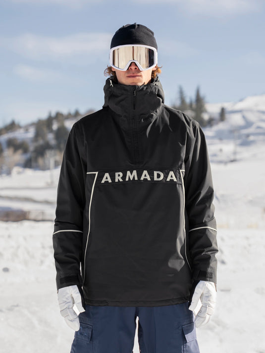 Person wearing an Armada jacket in a snowy landscape