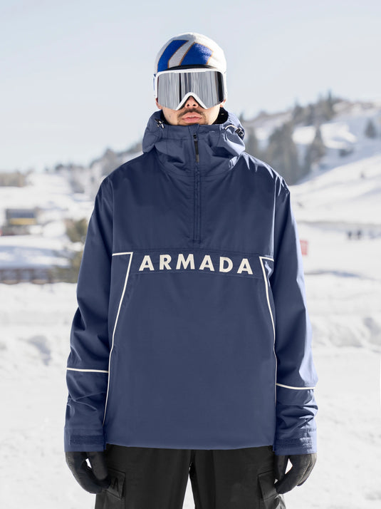 Person wearing a blue Armada jacket on a snowy background