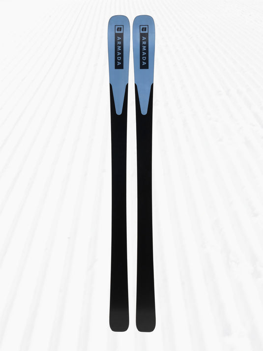 Two black skis with blue tips and tails on a white background