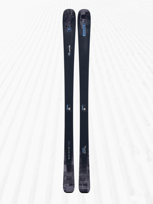 Pair of black skis with branding on a white background