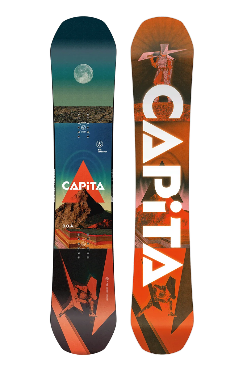 Load image into Gallery viewer, Front and back views of a CAPiTA snowboard on a plain white background. The top sheet features a dark teal-to-orange gradient with a moon graphic, mountain, and orange geometric shapes, while the bottom sheet is predominantly orange with large white CAPiTA lettering and black graphic accents.
