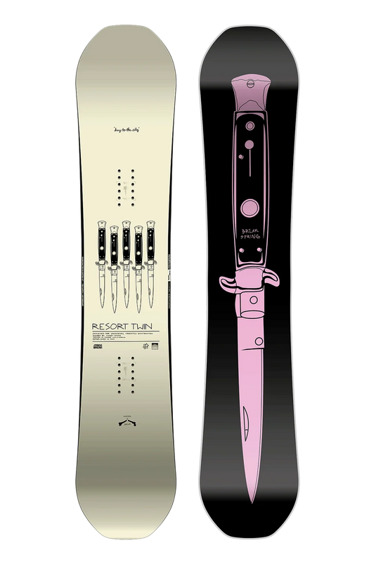 Front and back views of a Capita Spring Break Resort Twin snowboard on a white background. The top sheet is cream with black graphics and text, and the bottom sheet is black with a pink knife graphic.