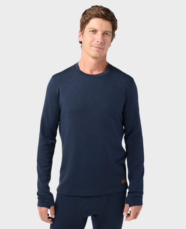 Load image into Gallery viewer, A man wearing a dark navy blue long-sleeve Stio crewneck shirt and matching pants, Ski and Tennis Station
