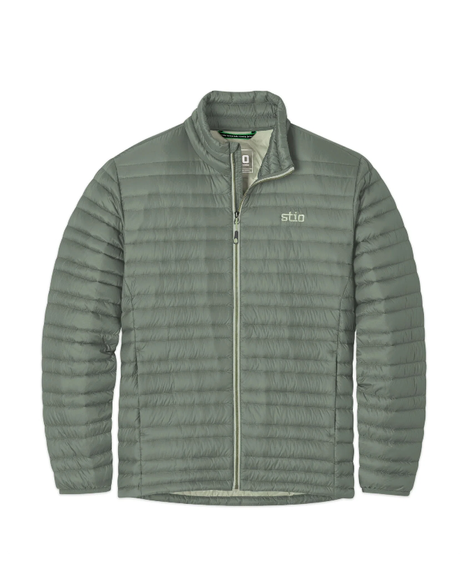 Load image into Gallery viewer, A sage green Stio puffer jacket with a full-zip front, stand-up collar. Ski and Tennis Station
