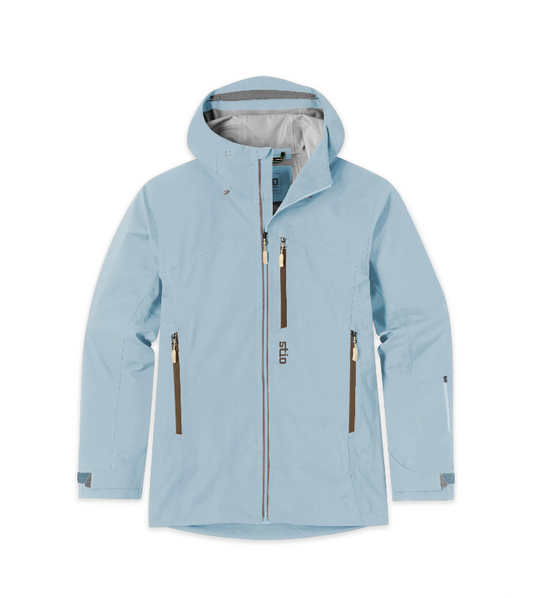 A light blue hooded Stio ski jacket with a full front zipper, two vertical zippered hand pockets, and a gray interior lining. Ski and Tennis Station.