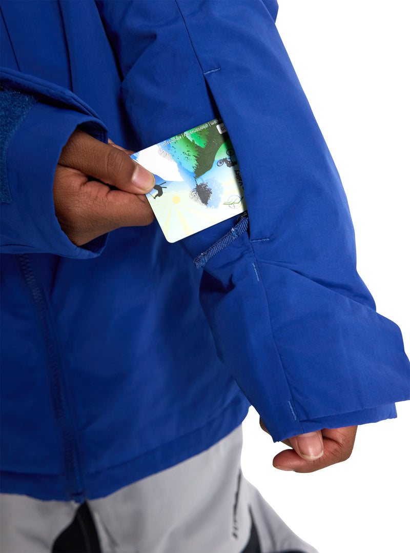 Load image into Gallery viewer, Person wearing a blue Burton jacket with a card or slope pass holder on a white background
