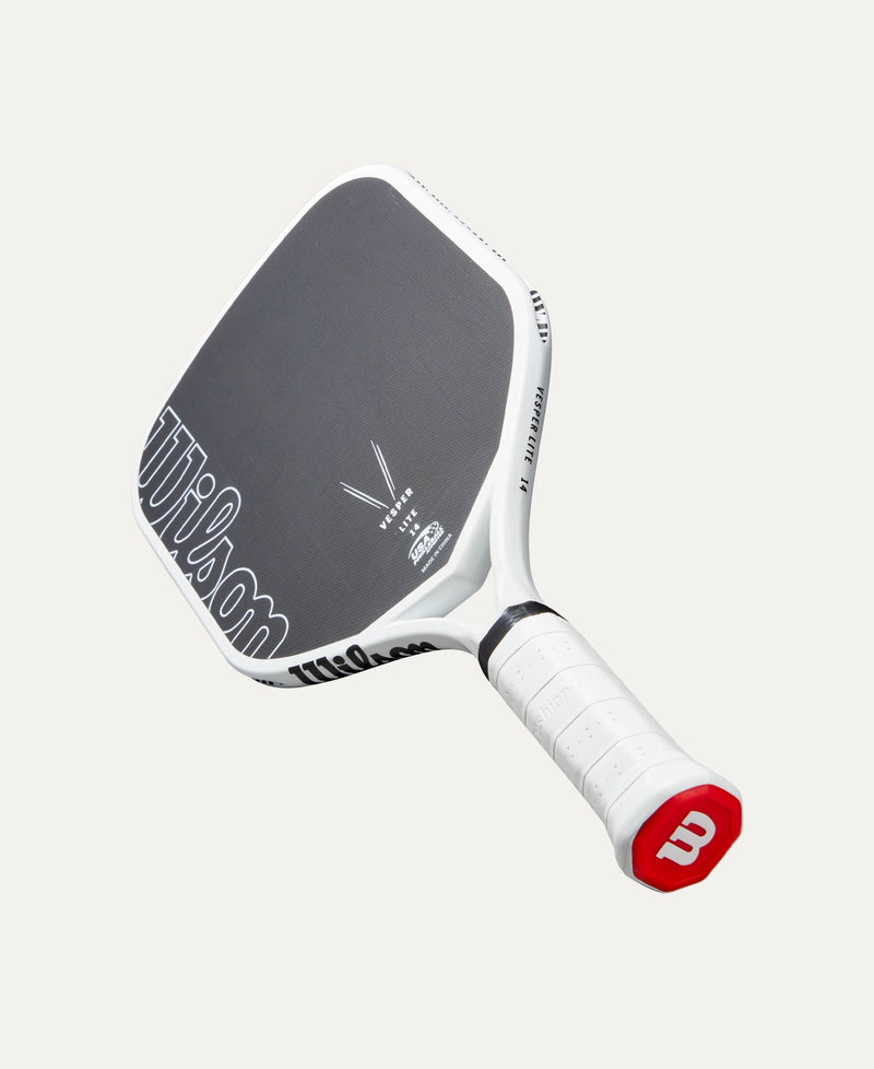 Load image into Gallery viewer, Pickleball paddle with Wilson branding on a light gray background
